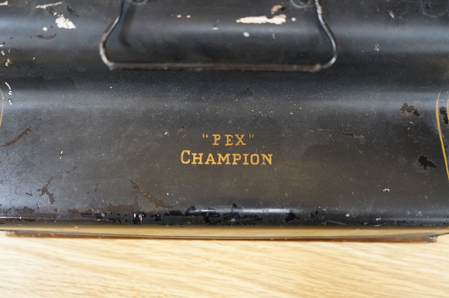 A Peoples Champion Indexing Typewriter, circa 1893, by the Garvin Machine Co., New York, on a mahogany plinth, with black tin cover, inscribed ‘’PEX’’ CHAMPION, width 28cm; a Bar-Let vintage typewriter, cased; an Underwo